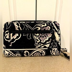 Vera Bradley wallet with strap.